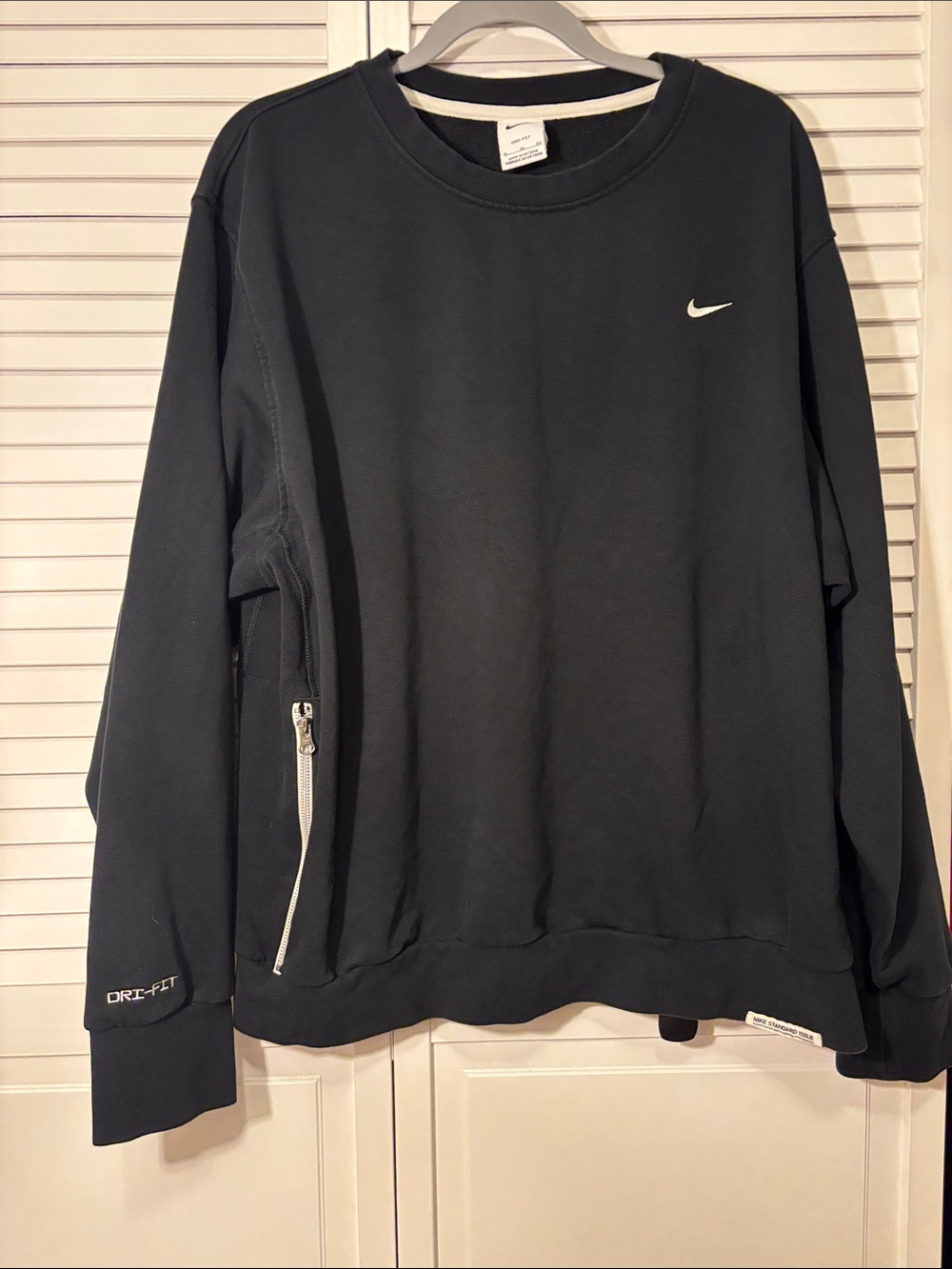 Nike Black Crewneck with White Swoosh and Zip Pocket